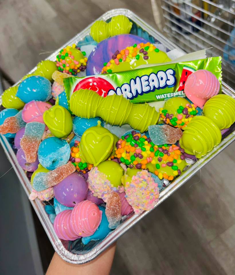 Layered candy-coated fruit platter display